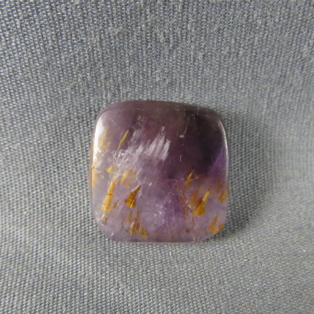 Cacoxenite in Amethyst Cabochon