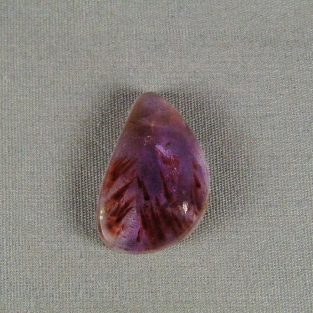 Cacoxenite in Amethyst Cabochon
