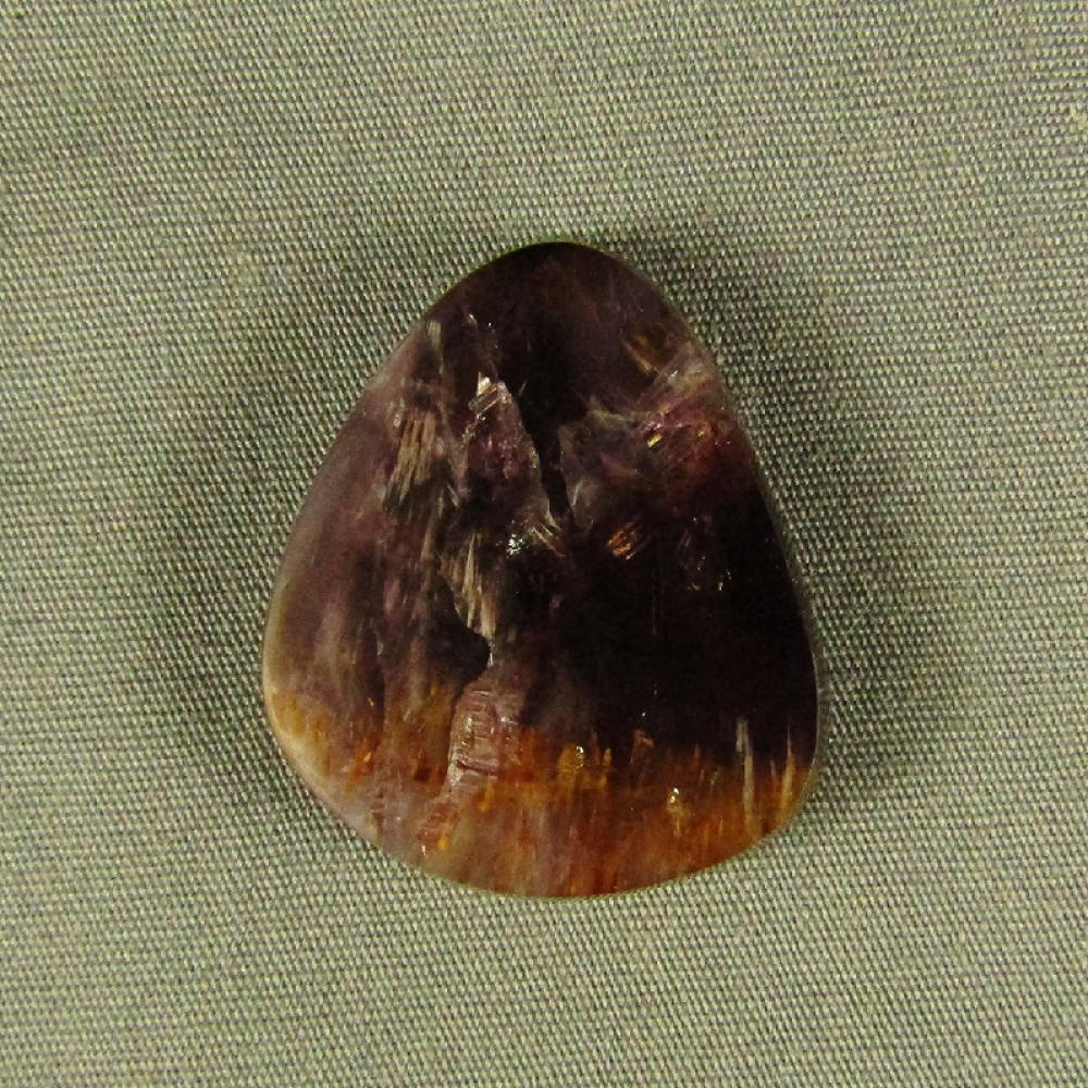 Cacoxenite in Amethyst Cabochon