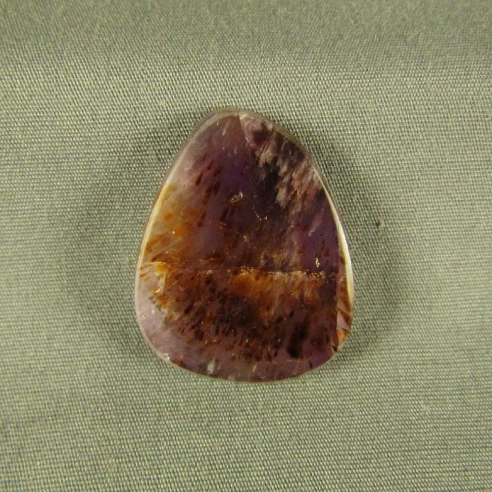 Cacoxenite in Amethyst Cabochon