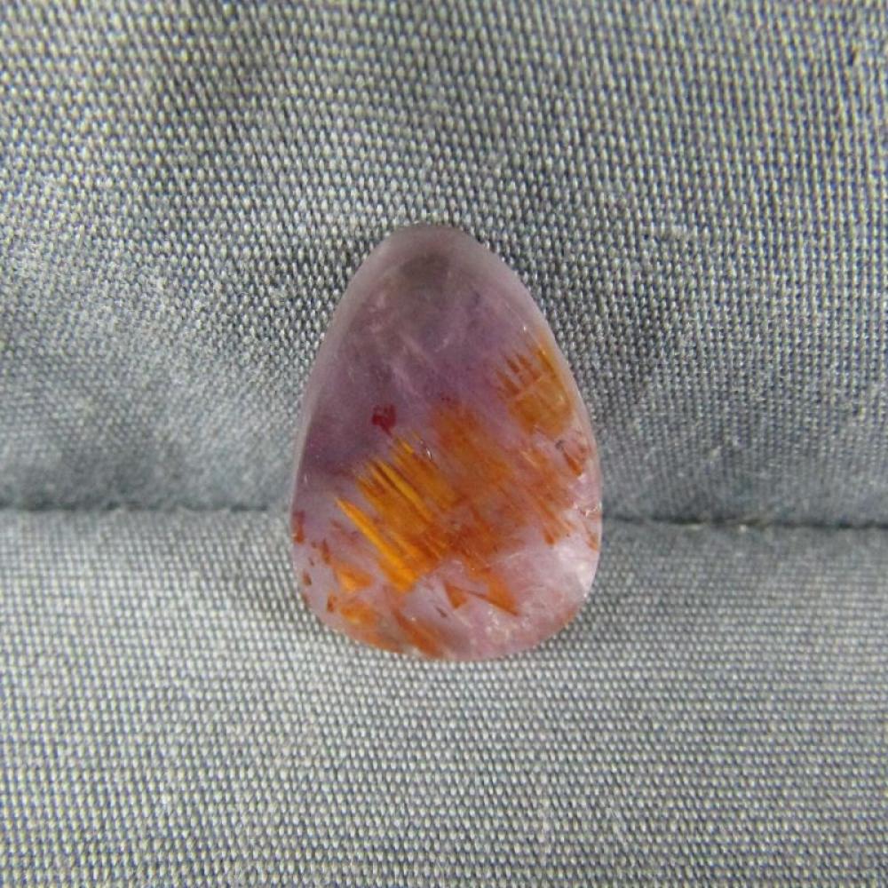 Cacoxenite in Amethyst Cabochon