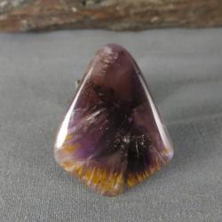 Cacoxenite in Amethyst Cabochon