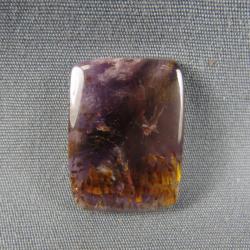 Cacoxenite in Amethyst Cabochon
