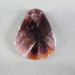 Cacoxenite in Amethyst Cabochon