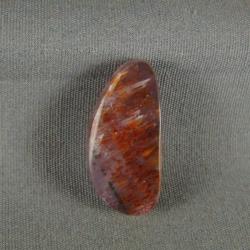 Cacoxenite in Amethyst Cabochon