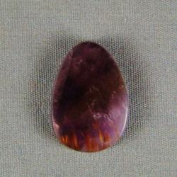 Cacoxenite in Amethyst Cabochon